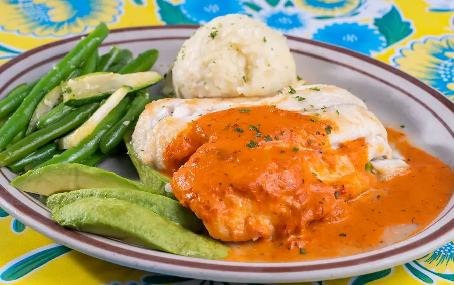 Fresh catch grouper with sauce at Little Bar Goodland Florida